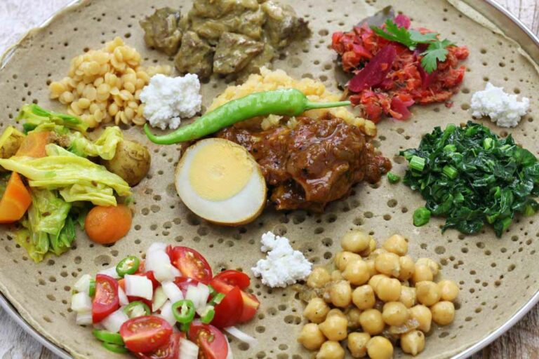 Is Ethiopian cuisine influenced by other cultures?